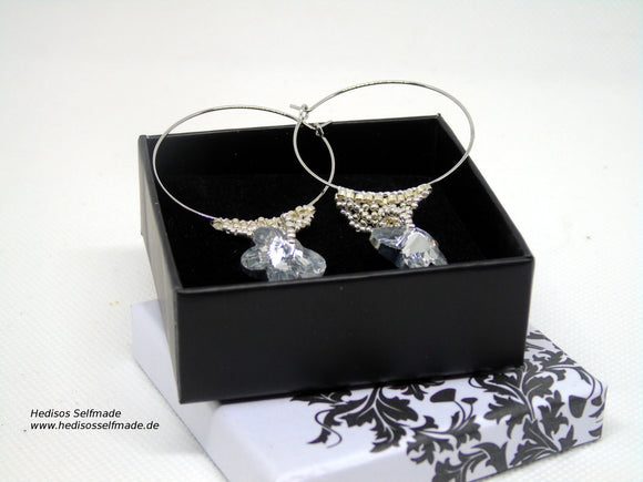 Ohrringe silber in Netztechnik gefädelt mit Swarovski-Schmetterling