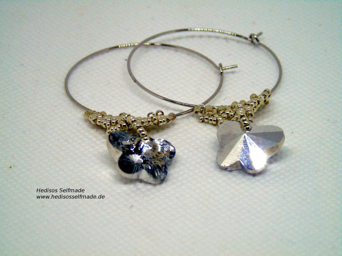 Ohrringe silber in Netztechnik gefädelt mit Swarovski-Schmetterling