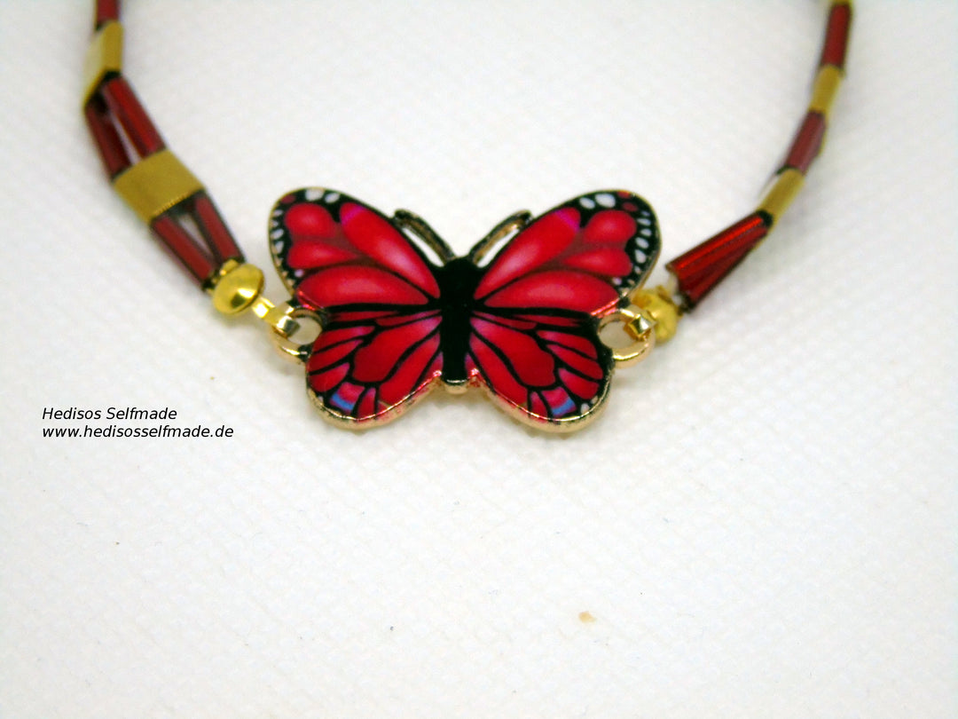 Armband "Schmetterling" aus Hämatit und Stäbchenperlen 18 cm elastisch